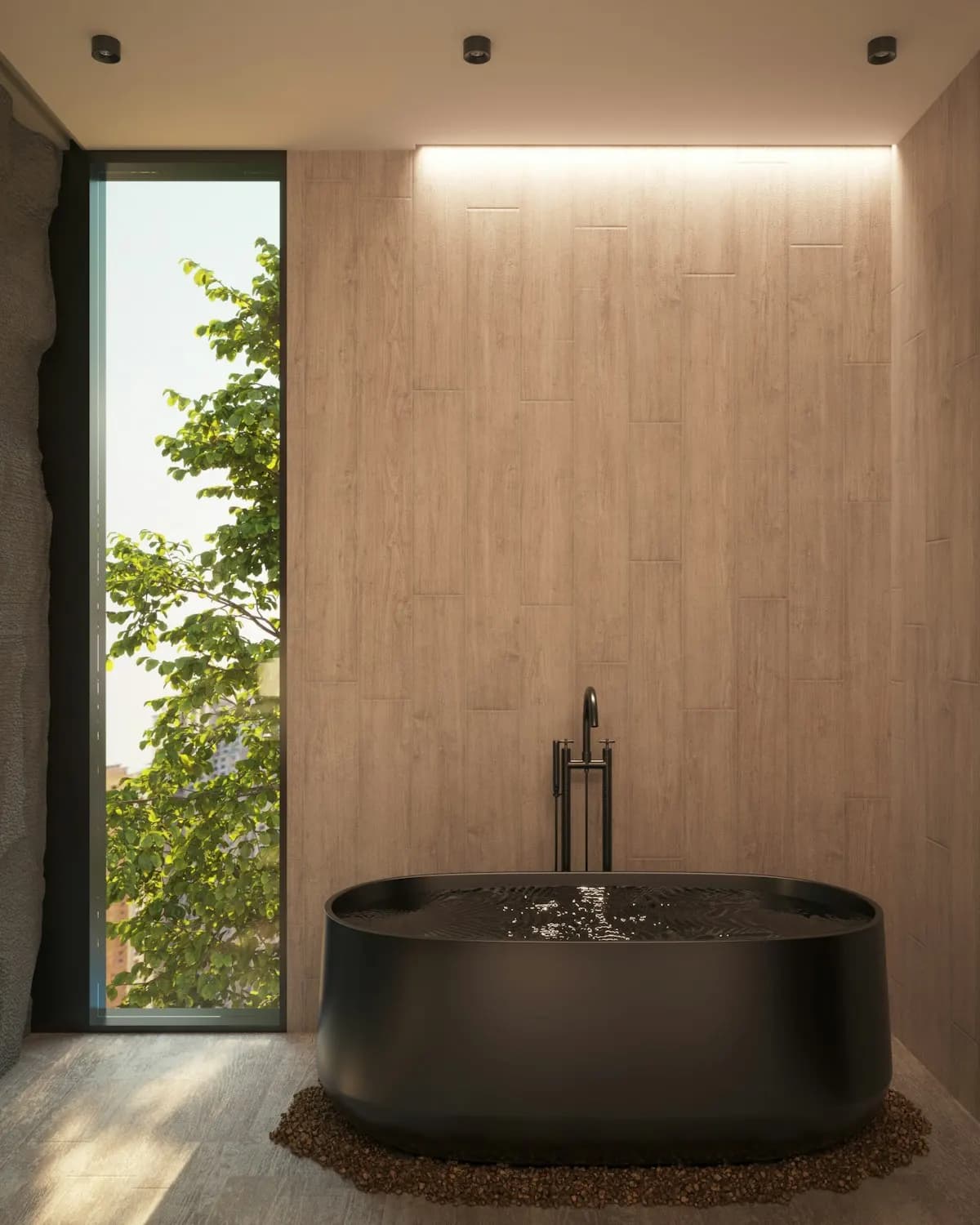 Dark freestanding bath against a tall textured wall
