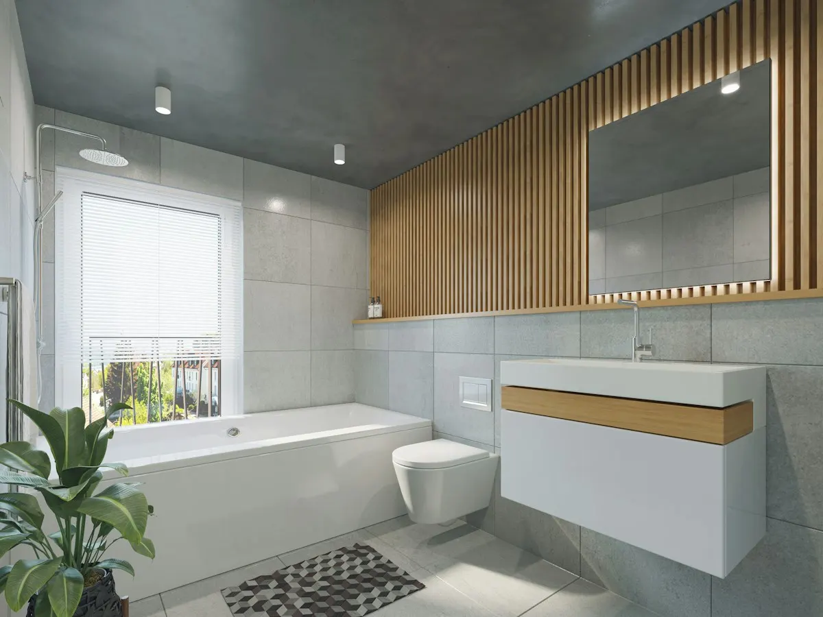 Bathroom with a freestanding bath and wall-mounted vanity