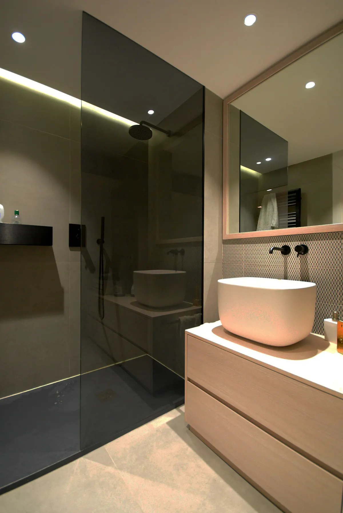 Double bathroom vanity with illuminated mirrors